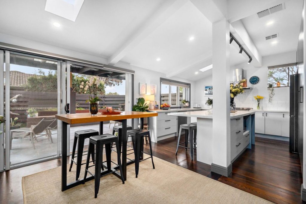 Completed kitchen renovation with view outdoors